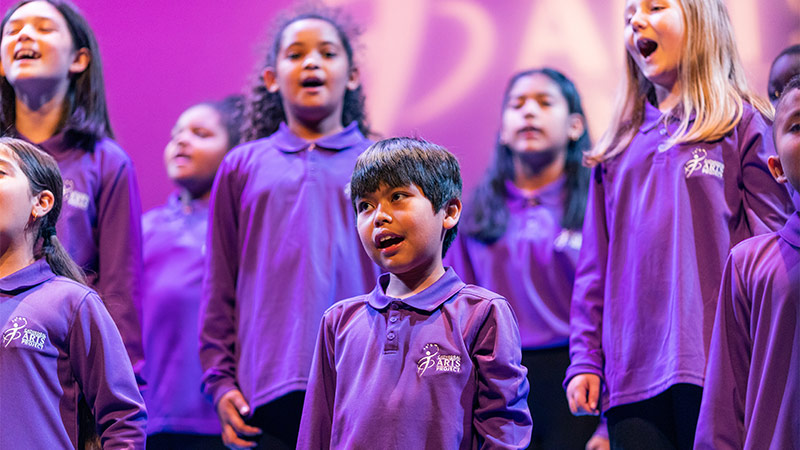 Image of a performance of children singing